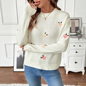 White knit sweater for women with sweet pink floral embroidery and ribbed round neck
