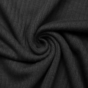 Macro shot of black rib-knit fabric texture for high neck long sleeve autumn dress