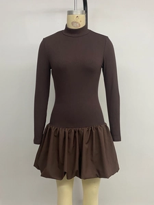 Detail of coffee brown high-neck ribbed knit dress with puffed bubble hemline