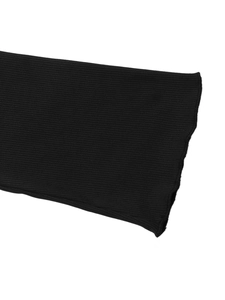 Close-up of black ribbed knit fabric detail showing texture and elasticity of the bodysuit