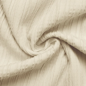 Close-up of cream textured fabric showing vertical stripes and fine weave details