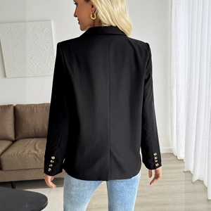 Back view of a tailored black women's suit blazer with elegant gold cuff button details