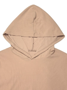 Detail view of khaki ribbed hoodie fabric texture and stitching on the hood and shoulders