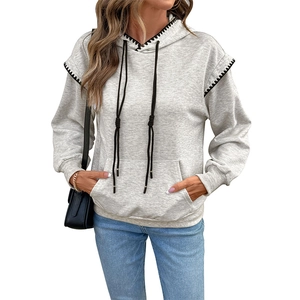 Loose fit light grey hooded sweatshirt with black decorative stitching and kangaroo pocket