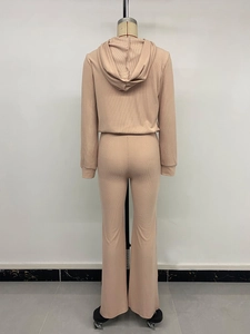 Detail view of the ribbed knit fabric on the back of hooded two-piece lounge set in apricot pink