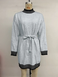 Detail of grey knit dress with striped ribbed neckline and adjustable waist drawstring