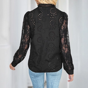 Back view of black lace long sleeve shirt featuring intricate hollow embroidery and floral details