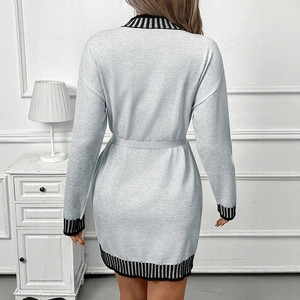 Gray knit midi dress with striped trim and matching waist belt shown from the back