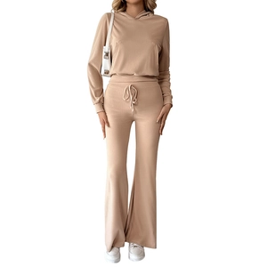 Women's oatmeal ribbed knit lounge set featuring a cropped hoodie and flared pants