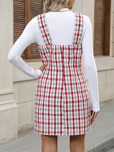 Detail of red and white plaid tweed pinafore dress with back invisible zipper