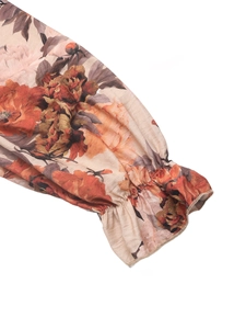 Detail of elastic ruffled cuffs on vintage floral print chiffon dress for women