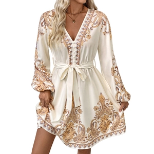 Elegant cream V-neck paisley print maxi dress with long sleeves and a matching waist belt