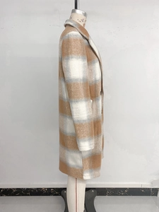 Side view of a long wool-blend coat featuring a classic brown, white, and grey plaid pattern