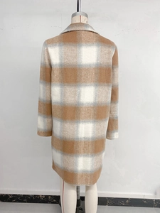 Rear view of long plaid wool coat on mannequin showing classic brown and grey grid pattern