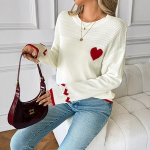 Women's cream knit sweater with red heart jacquard and crew neck for autumn style