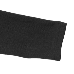 Detailed close-up of ribbed knit texture and stitching on black long sleeve cuffs
