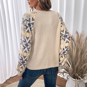 Women's crew neck waffle knit top with long sleeves featuring geometric ethnic prints