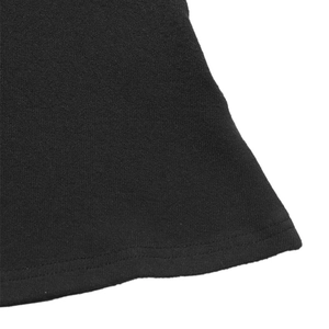 Detailed close-up showing double-needle hem stitching on black knit dress fabric