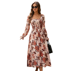 French vintage floral midi dress with square neck and smocked bodice in beige and orange