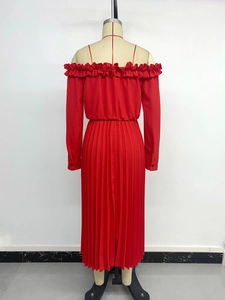 Detailed back view of a red pleated maxi dress with ruffled collar and long sleeves