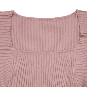 Detail of square neckline and ribbed knit texture on dusty pink sweater dress