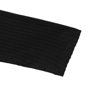 Detailed macro view of black ribbed knit fabric texture and neat stitching on cuff