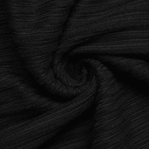 Close-up detail of premium black ribbed knit fabric with soft vertical texture