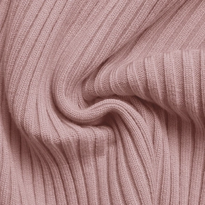 Detailed close-up of premium pink ribbed knit fabric with soft vertical texture