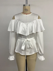 Detailed view of white off-shoulder satin shirt with ruffled V-neck and waist tie