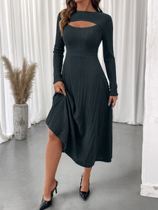Detail of elegant black long-sleeve ribbed knit dress with chic chest cutout design
