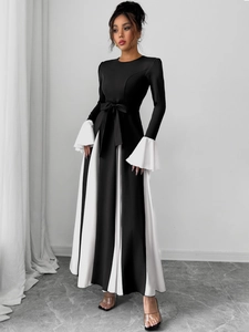 Detailed contrast patchwork A-line dress featuring white pleated hem and bell sleeves