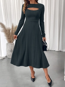 Detail of grey ribbed knit dress with unique crescent cutout and elegant crew neckline