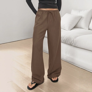 Women's brown wide-leg drawstring pants with elastic waist and textured fabric