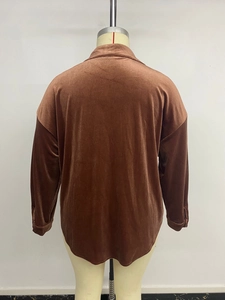 Back view of a brown velvet long sleeve shirt showing the soft fabric texture and curved hem
