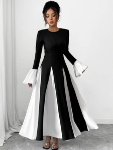 Detail view of the elegant black and white patchwork flare sleeve A-line long dress