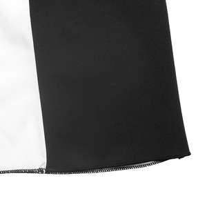 Detail of A-line dress hem showing high-quality stitching and contrast color panels