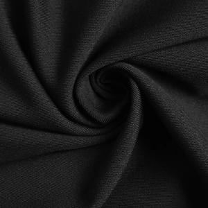Detailed macro view of black high-density knit fabric showing texture and soft drape