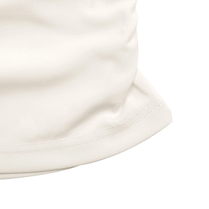 Detail of the double-needle stitched hem on this elegant off-white long sleeve top