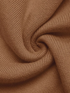 Macro shot showing soft rib-knit texture and camel brown wool fabric detail