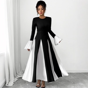 Elegant A-line long dress with round neck, flared white sleeves and black contrast panels