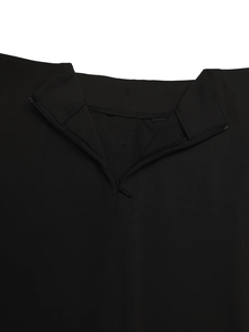 Detail view of the elegant black skirt waist featuring a hidden zipper and premium stitching