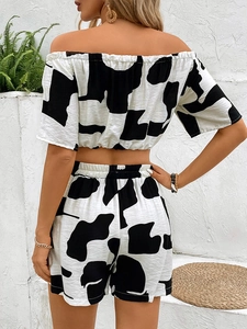 Women's summer two-piece cow print crop top and high-waist shorts vacation set