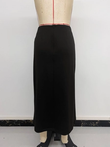 Detail view of high waist black midi skirt showing the invisible back zipper and smooth fabric