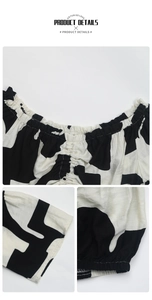 Detail of smocked elastic neckline and abstract geometric black and white print fabric