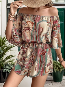Close-up of bohemian paisley romper featuring off-shoulder neckline and drawstring waist
