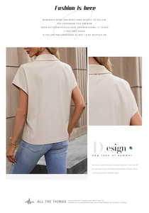 Detail showing the geometric star-shaped embossed texture on this polo collar top