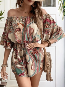 Detail of bohemian paisley print romper with off-shoulder neckline and bell sleeves