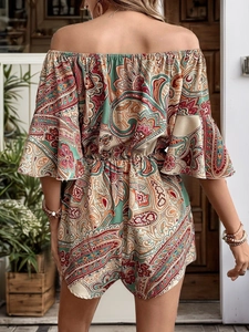 Detail of bohemian paisley print on elastic waist romper with ruffled bell sleeves