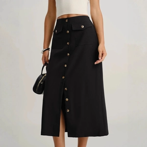 Elegant black mid-length skirt with vintage buttons and decorative flap pockets
