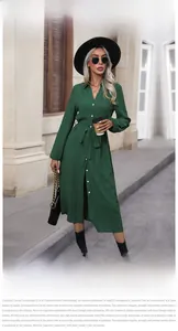 Detailed view of the dark green shirt dress featuring lapel collar and waist belt